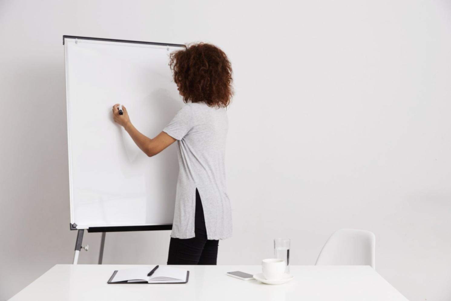 International student reviewing financial documents with advisor