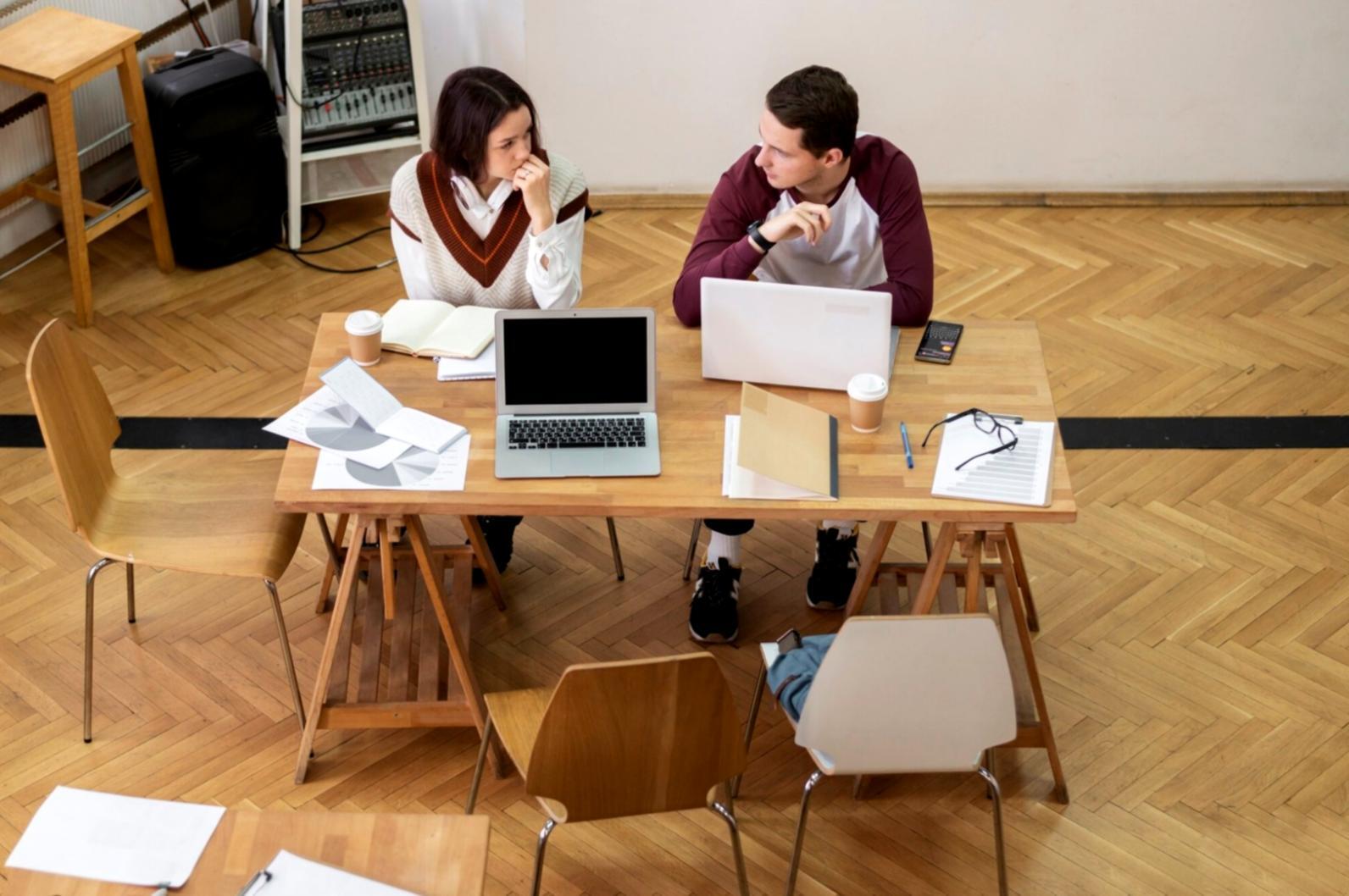 Student reviewing financial documents during learning session